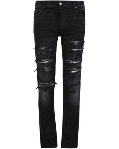 Amiri Schwarze skinny jeans mit ripped details