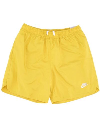 Nike Gewebte flow shorts - Gelb