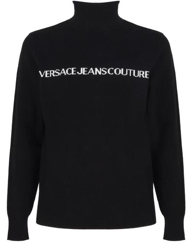 Versace Schwarze sweaters mit rollkragen und logo