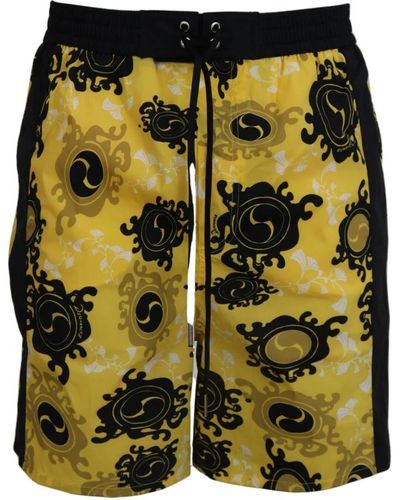 DSquared² Shorts da mare gialli e neri stampati - Giallo