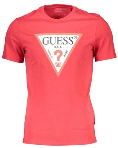 Guess T-shirt in cotone con stampa logo accattivante - Rosa