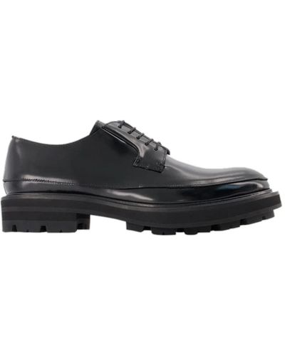 Alexander McQueen Zapatos planos oversize de cuero - Negro
