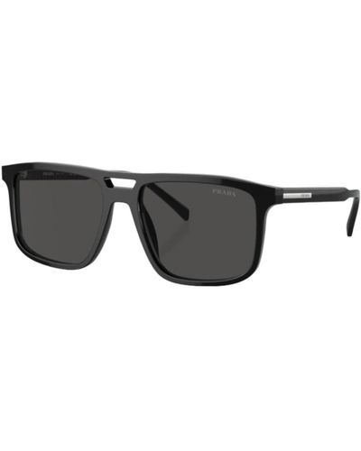 Prada Stilvolle sonnenbrille in schwarz und grau
