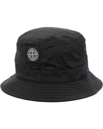 Stone Island Schwarze hüte mit kompass-patch-logo