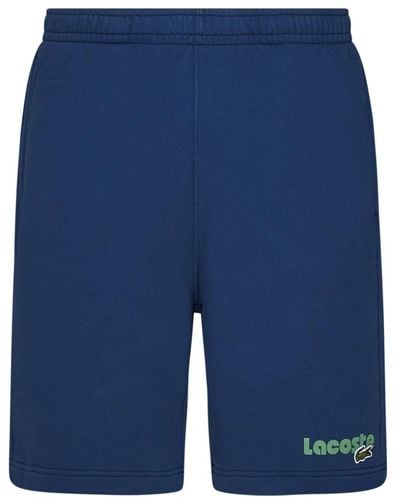 Lacoste Blaue shorts mit logo-druck,kurze shorts für männer