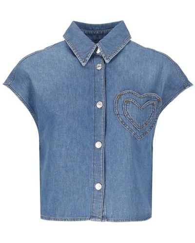 Moschino Camisa sin mangas azul claro con bolsillo de corazón