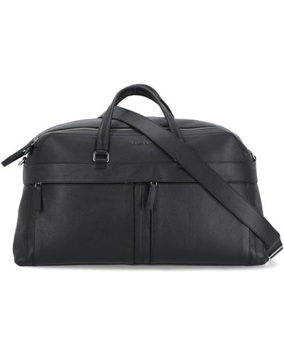 Orciani Schwarze leder-duffel-tasche mit griffen und schultergurt