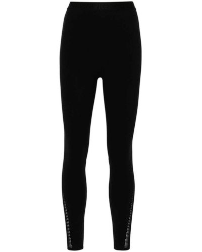 Wolford Pantalones negros super-skinny con cinturón logo
