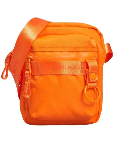Calvin Klein Cross Body Bags - Orange