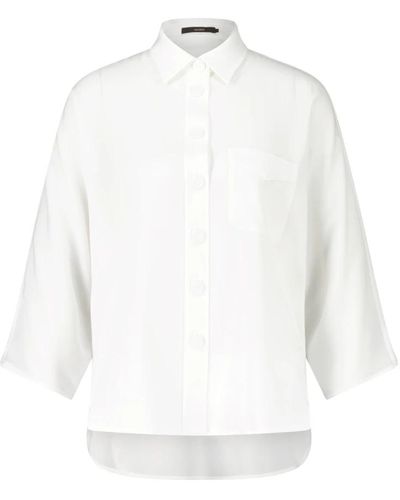 Windsor. Ampia camicia da donna con bottoni in tessuto - Bianco