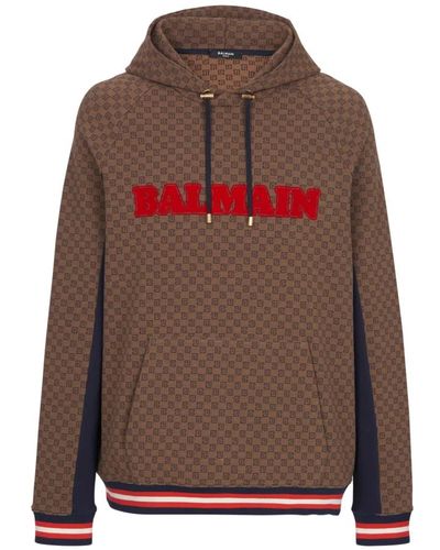 Balmain Brauner pullover mit verstellbarer kapuze und kontrastierenden einsätzen