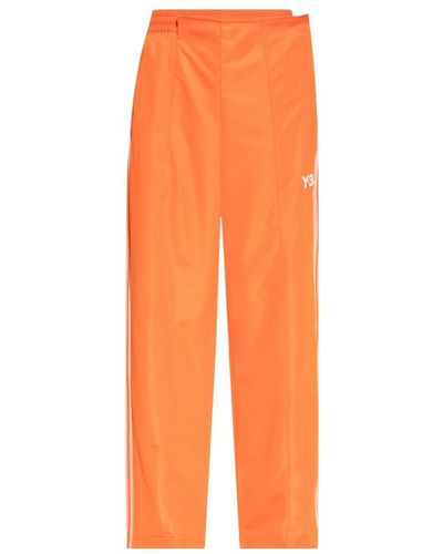Y-3 Pantalones de entrenamiento con logotipo - Naranja