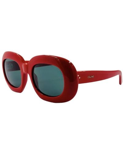 Celine Ovale rote sonnenbrille mit grünen gläsern