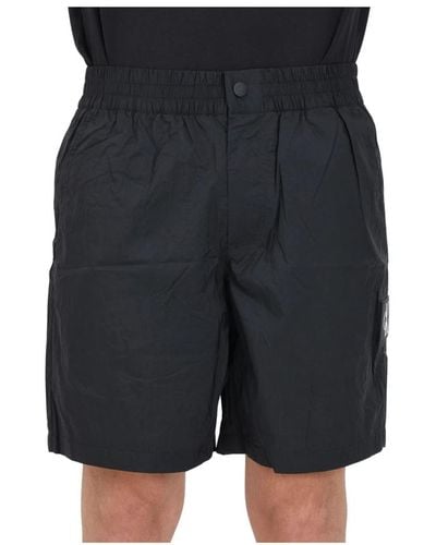 Calvin Klein Schwarze shorts mit logo patch