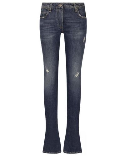 Dolce & Gabbana Jeans slim-cut blu con dettagli strappati