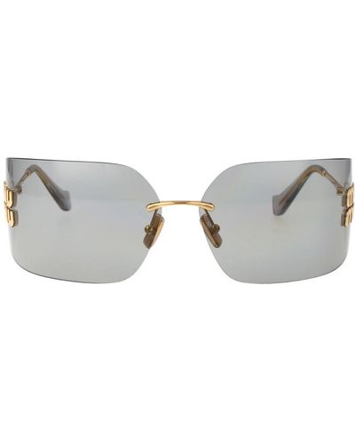 Miu Miu Stylische sonnenbrille mit einzigartigem design - Grau