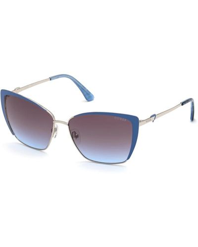 Guess Stilvolle sonnenbrille mit blauer verlaufslinse