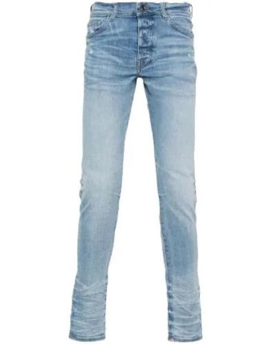 Amiri Zerrissene skinny jeans - Blau