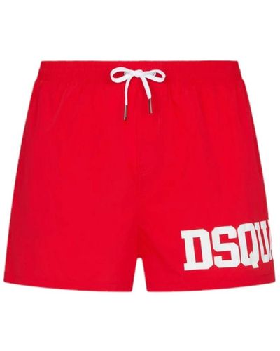 DSquared² Combinazione ideale tra comfort e stile. il boxer mare a metà coscia ha un elastico in vita e coulisse con finalino di metallo - Rosso