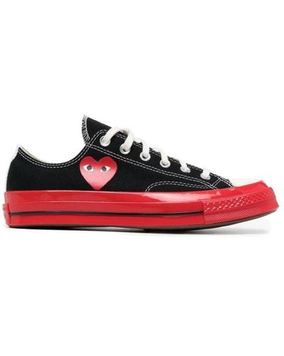 COMME DES GARÇONS PLAY Schwarzer chuck taylor low sneaker mit roter sohle
