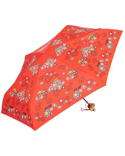 Moschino Roter blumenregenschirm mit spielzeugbär
