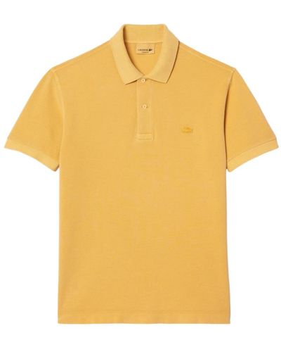 Lacoste Tops > polo shirts - Jaune