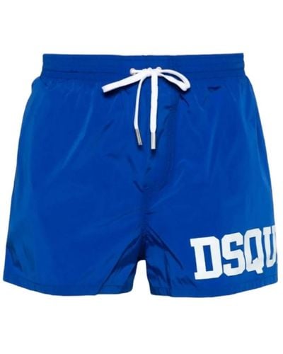 DSquared² Combinazione ideale tra comfort e stile. il boxer mare a metà coscia ha un elastico in vita e coulisse con finalino di metallo - Blu