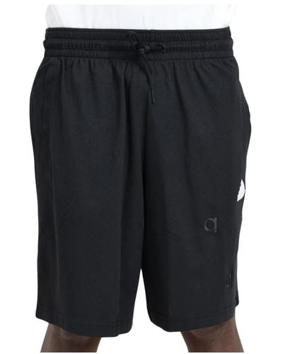 adidas Sportliche schwarze logo patch shorts