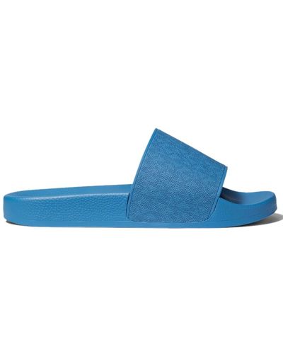 Michael Kors Jake monogram logo glisse des sandales - Bleu