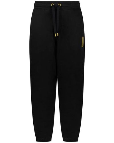 Calvin Klein Pantaloni tuta neri fleece polsini elastici - Nero