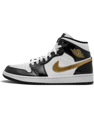 Nike Sneakers in pelle nera e oro - Nero