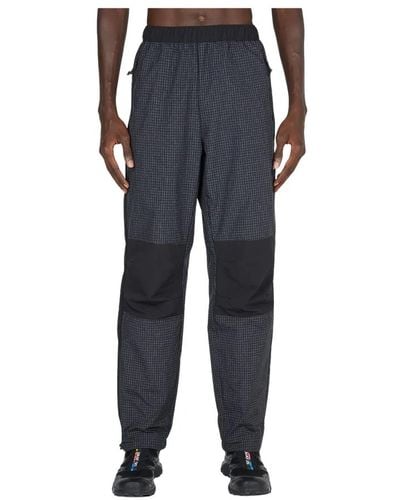 The North Face Pantaloni da jogging con stampa logo shell - Blu