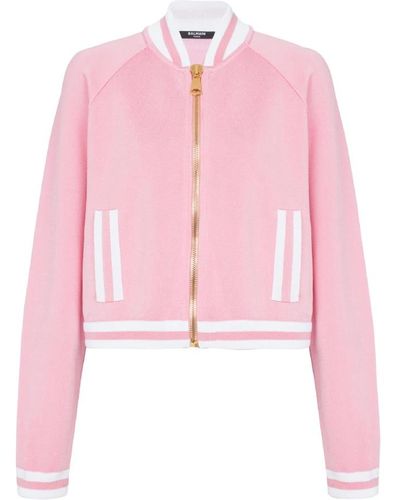 Balmain Cropped knitted varsity jacket with striped details - Rosa