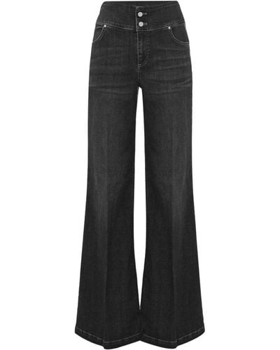 Kocca Ausgestellte Jeans mit hoher Taille - Schwarz