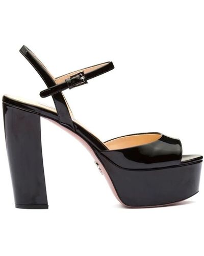 Prada Eleva tu estilo con sandalias de plataforma de cuero - Negro