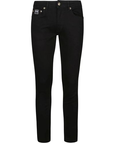 Versace Schwarze skinnny narrow dundee jeans