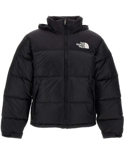 The North Face Down Jackets - Blue