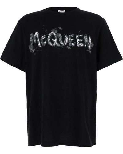 Alexander McQueen Schwarzes t-shirt mit graffiti-logo-druck