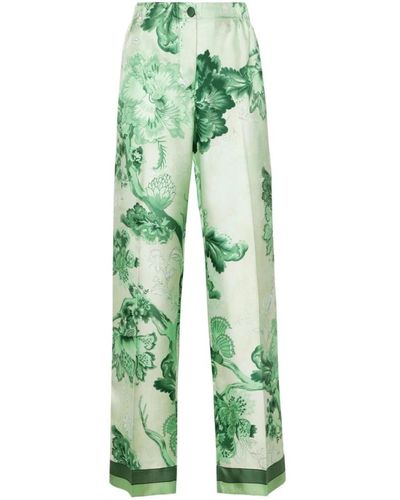 F.R.S For Restless Sleepers Pantalones verdes de seda con estampado floral