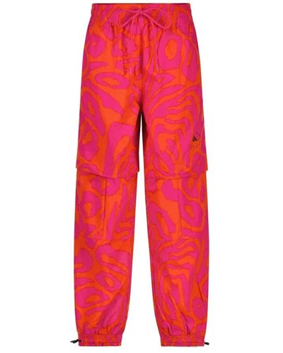 adidas By Stella McCartney Pantalones de jogging con estampado animal y logotipo - Rojo