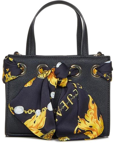 Versace Schwarze handtasche mit bedrucktem schal und abnehmbarem riemen - Blau
