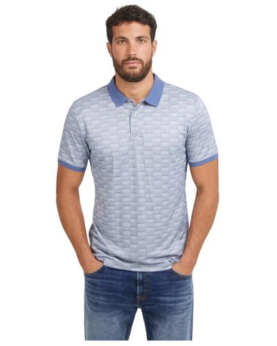 Guess All over logo print polo blu