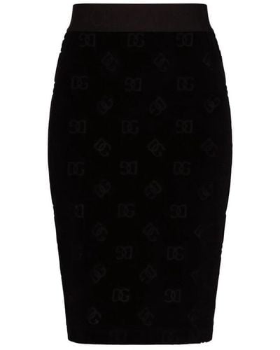 Dolce & Gabbana Flocked Jersey Midi Skirt With All-over Dg Logo - Black