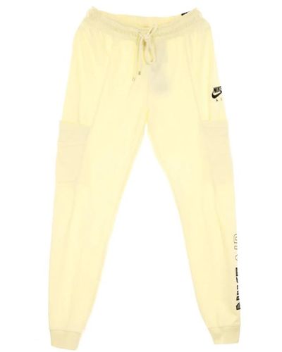 Nike Schwarze fleece air pant - Gelb