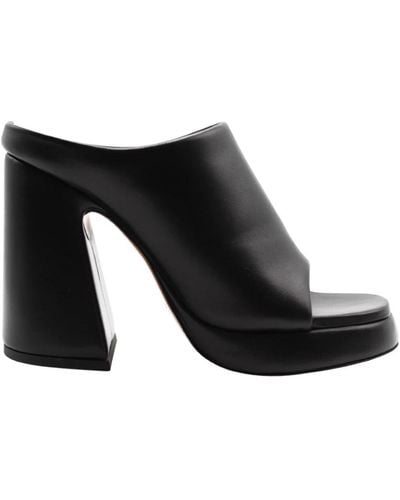 Proenza Schouler Eleva tu estilo con sandalias de plataforma - Negro