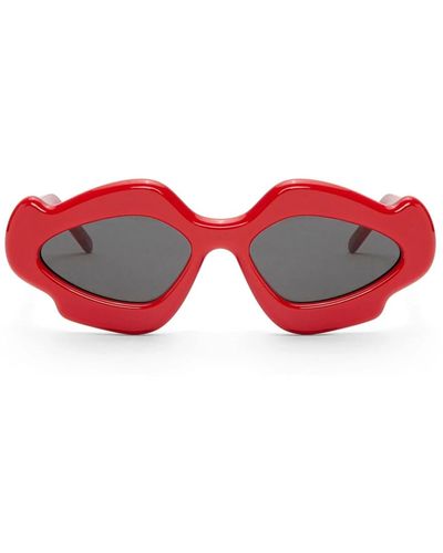 Loewe Rote sonnenbrille mit ovalen gläsern