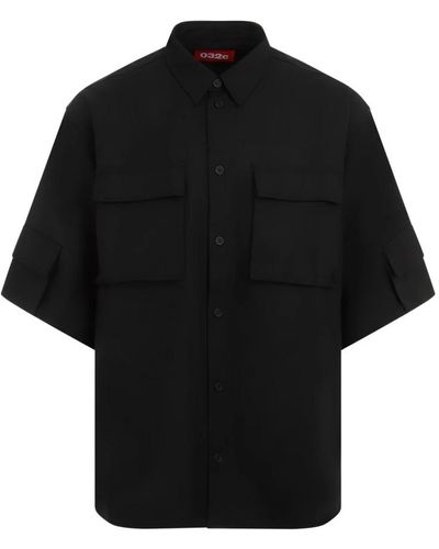 032c Camicia nera in lana con tasca - Nero