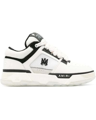 Amiri Weiße/schwarze leder low-top sneakers