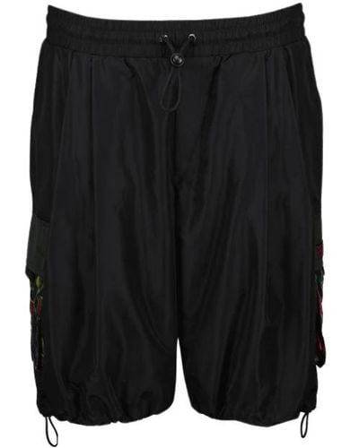 Dolce & Gabbana Blumige nylon shorts - Schwarz