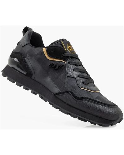 Cruyff Minimalistische schwarz/gold sneakers